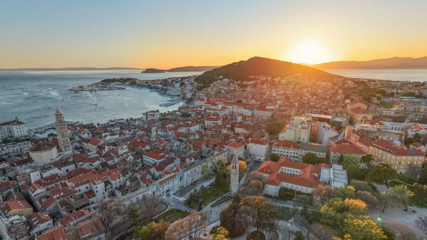 Sunset over Split’s Old Town, the waterfront and Marjan Hill